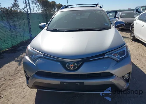 2018 Toyota Rav4 Limited from USA, damaged, VIN 2T3YFREV9JW457655